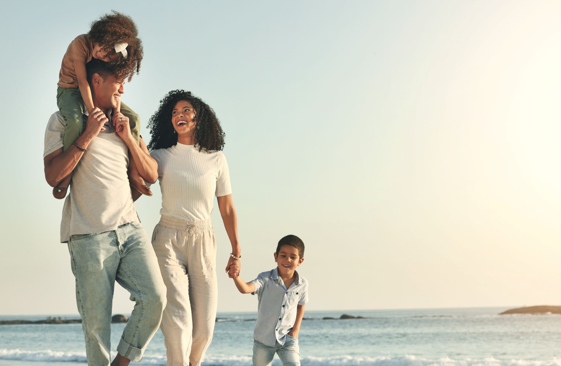 happy summer and walking family on the beach